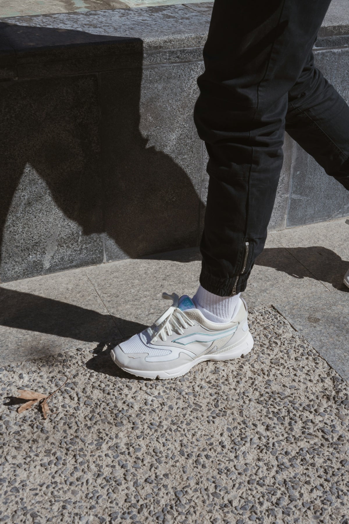 a person's legs and shoes