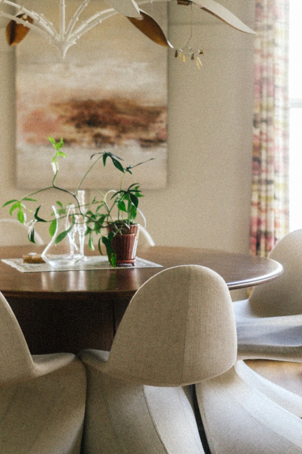 A cozy dining room is furnished with style